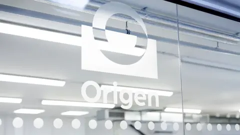 Origen logo on glass wall